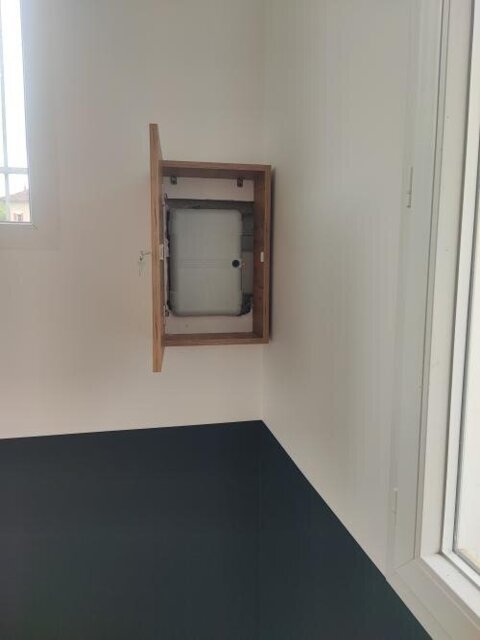 Photo client — cache Clim-Box posé (2/2)