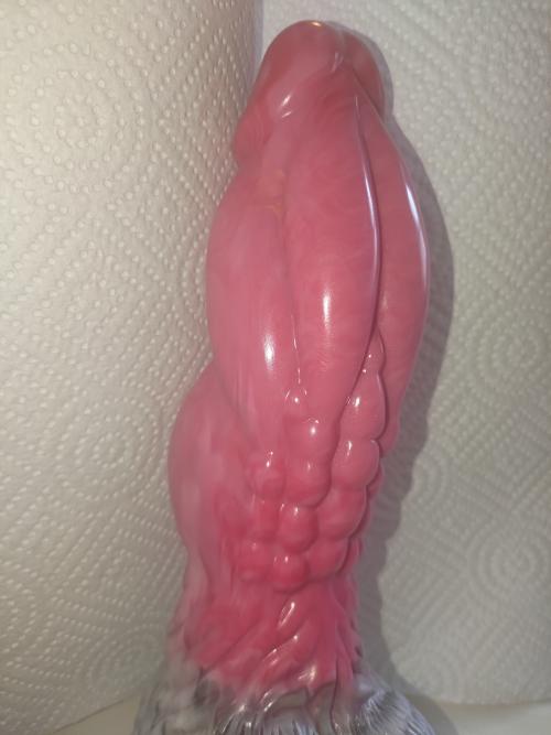 Gold Dragon Dildo in pink colourway — customer photo review showing layered scale texture