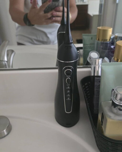 Appareil de nettoyage des dents à jet d'eau 4-en-1