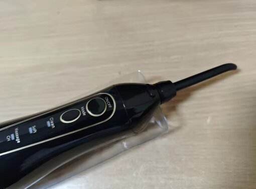 Appareil de nettoyage des dents à jet d'eau 4-en-1