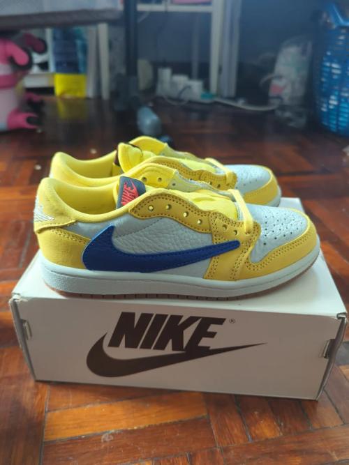 Customer photo of AJ 1 Low x Travis Scott 'Canary'
